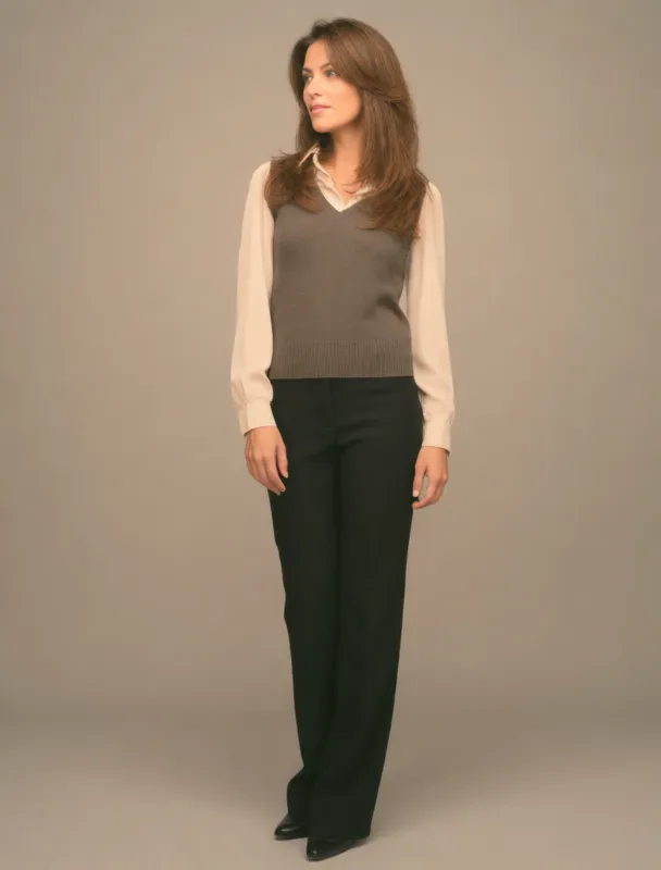 sweater vest over a collared blouse by krea 2