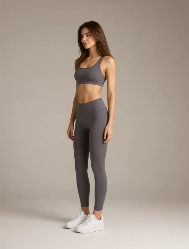 sports bra with high waisted leggings by qwen image 2.1