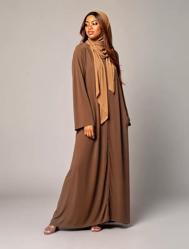 long flowing abaya with a hijab by moss image sft